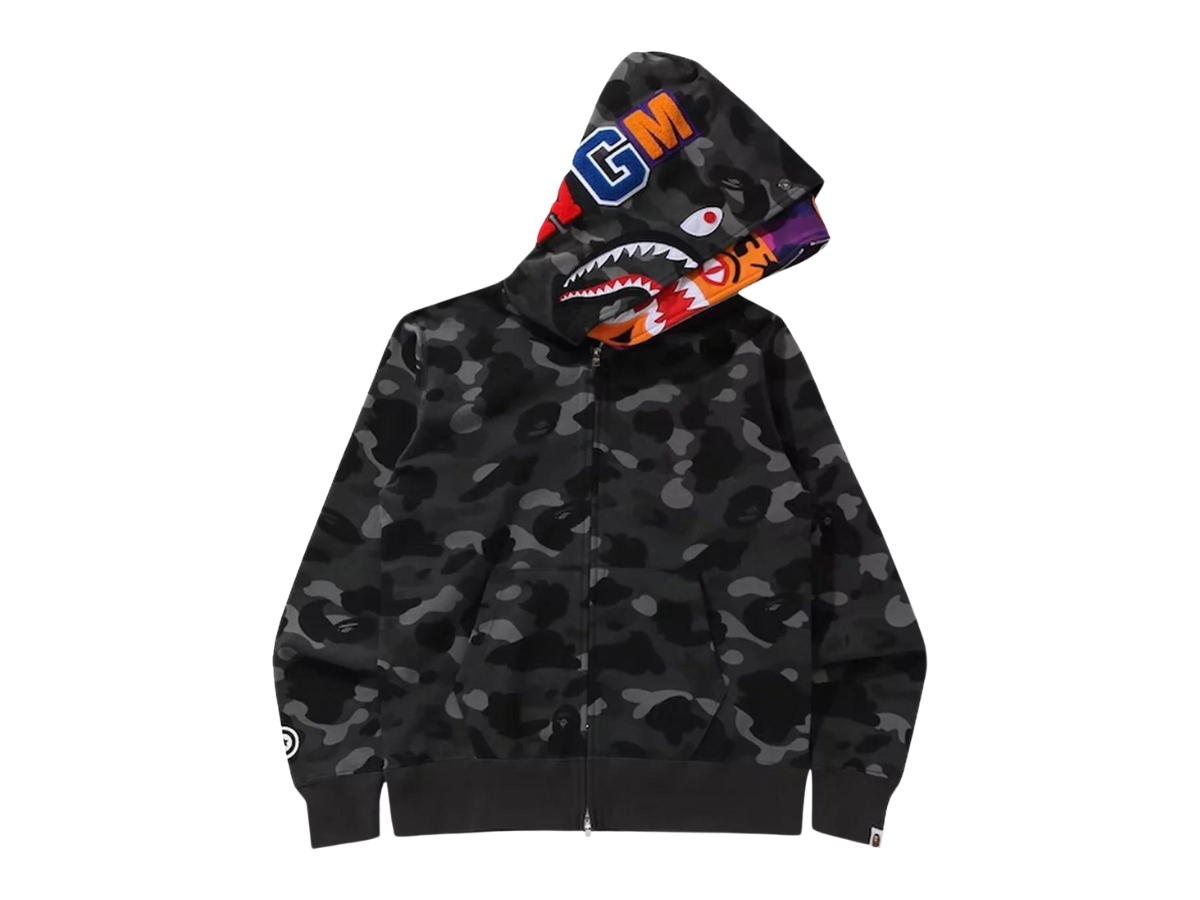 https://d2cva83hdk3bwc.cloudfront.net/0039-1ss210106ccts-blac-bape-color-camo-tiger-shark-wide-full-zip-double-hoodie-black-ss21-1.jpg