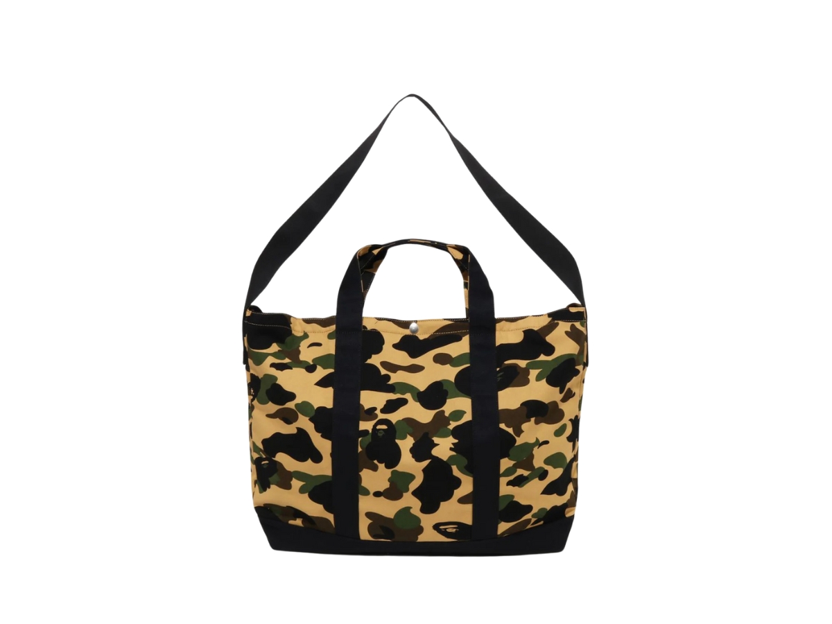 https://d2cva83hdk3bwc.cloudfront.net/0zxbgm006891o-yellow-bape-1st-camo-2way-tote-bag-yellow-2.jpg