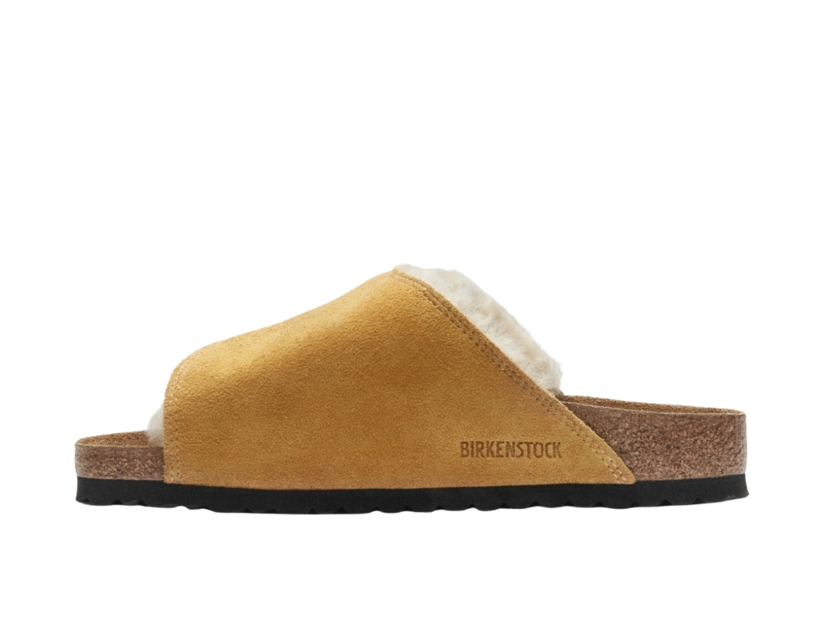 https://d2cva83hdk3bwc.cloudfront.net/1027686-st-ssy-birkenstock-solana-shearling-slide-caramel-2.jpg