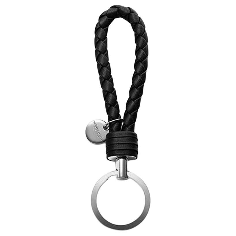 https://d2cva83hdk3bwc.cloudfront.net/113539V3UN11189-bottega-veneta-keychains-unisex-black-1.jpg