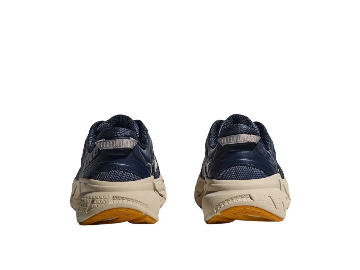 https://d2cva83hdk3bwc.cloudfront.net/1160050-VYS-hoka-clifton-l-athletics-varsity-navy-sesame-5.jpg