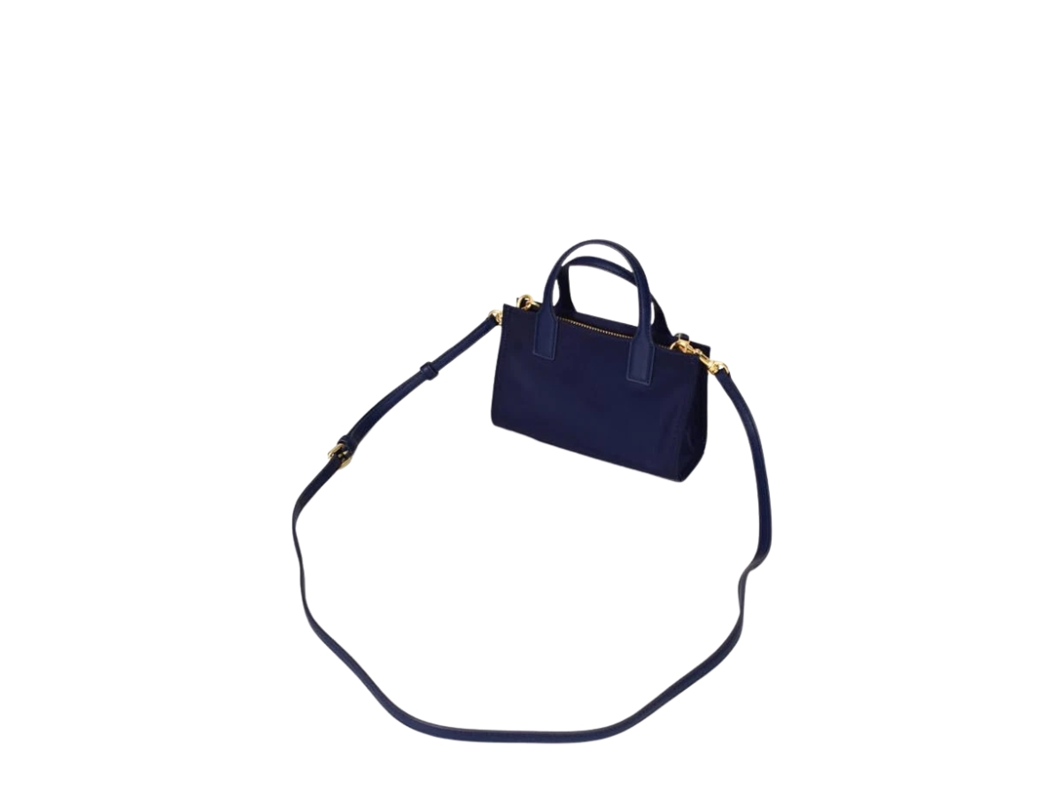 https://d2cva83hdk3bwc.cloudfront.net/146437-tory-burch-ella-nylon-logo-mini-tote-in-nylon-with-gold-hardware-3.jpg