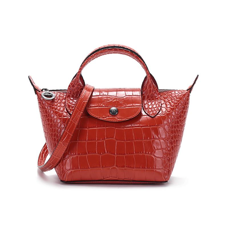 https://d2cva83hdk3bwc.cloudfront.net/1500HVC017-longchamp-le-pliage-cuir-cow-leather-handbag-mini-women-s-citrus-orange-1.jpg