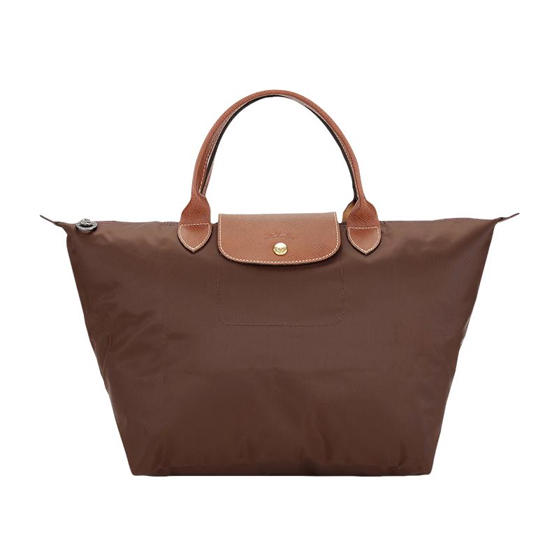 https://d2cva83hdk3bwc.cloudfront.net/1623089P81-longchamp-le-pliage-polyamide-canvas-with-leather-trim-dumpling-bag-handbags-medium-size-women-s-ebony-1.jpg