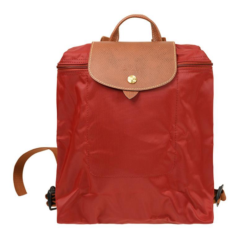 https://d2cva83hdk3bwc.cloudfront.net/1699089P590-longchamp-nylon-backpack-women-s-red-1.jpg