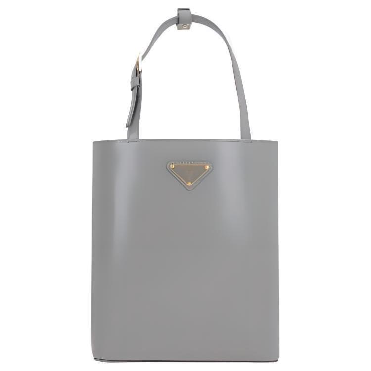 https://d2cva83hdk3bwc.cloudfront.net/1BA401_ZO6V_F0424-prada-polished-calfskin-shoulder-bag-crossbody-bag-handbag-women-s-gray-1.jpg
