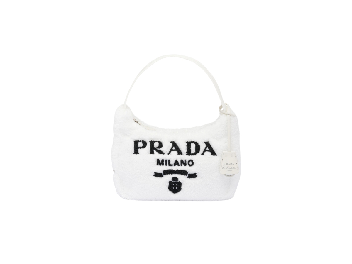 https://d2cva83hdk3bwc.cloudfront.net/1ne515-2dxo-f0964-prada-re-edition-2000-terry-mini-bag-handle-white-1.jpg
