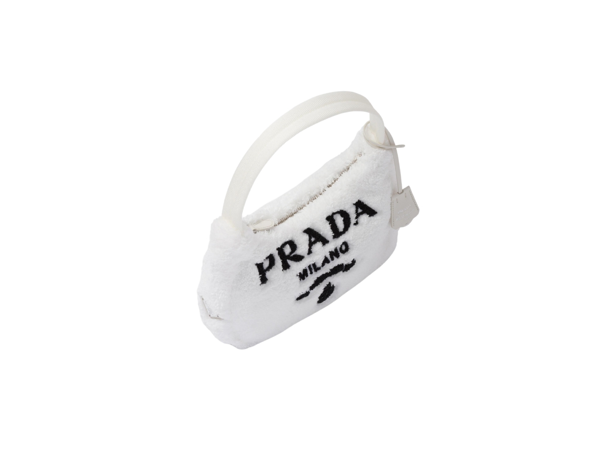 https://d2cva83hdk3bwc.cloudfront.net/1ne515-2dxo-f0964-prada-re-edition-2000-terry-mini-bag-handle-white-3.jpg