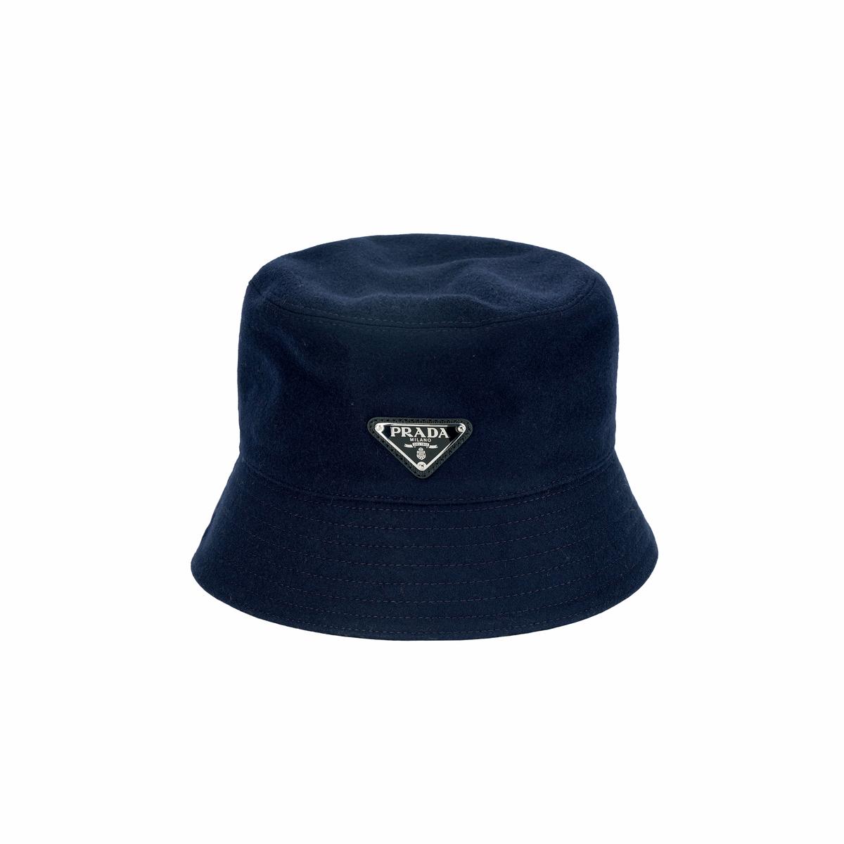 https://d2cva83hdk3bwc.cloudfront.net/2HC1371UMTF0124-prada-logo-plaque-wool-bucket-hat-1.jpg