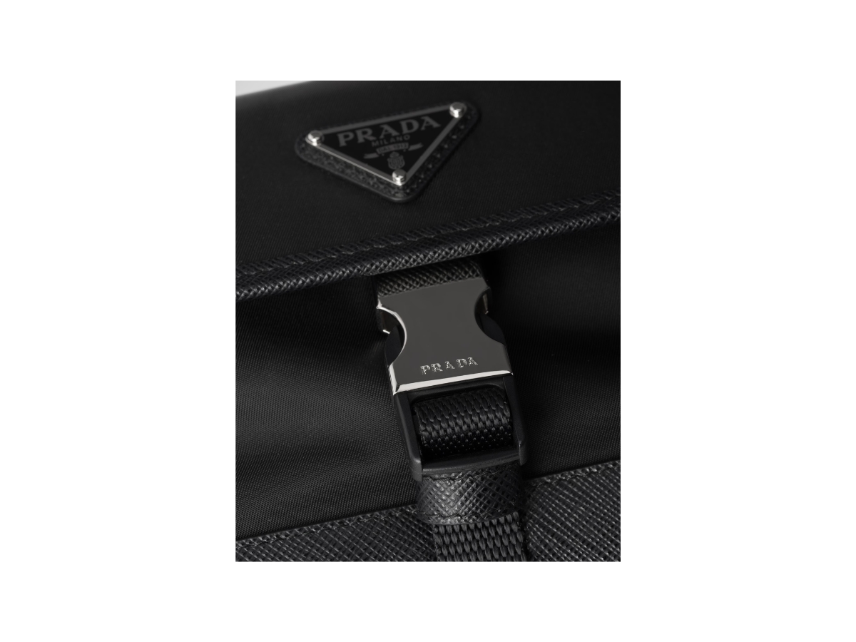 https://d2cva83hdk3bwc.cloudfront.net/2zh1082dmhf0002-prada-re-nylon-and-saffiano-leather-smartphone-case-black-small-strap-4.jpg