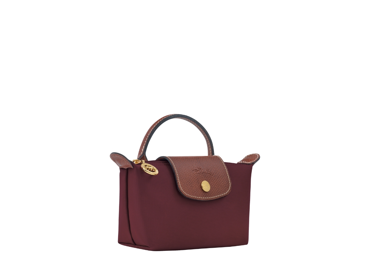 https://d2cva83hdk3bwc.cloudfront.net/34175089P87-longchamp-le-pliage-original-pouch-with-handle-in-recycled-canvas-with-gold-hardware-burgundy-2.jpg