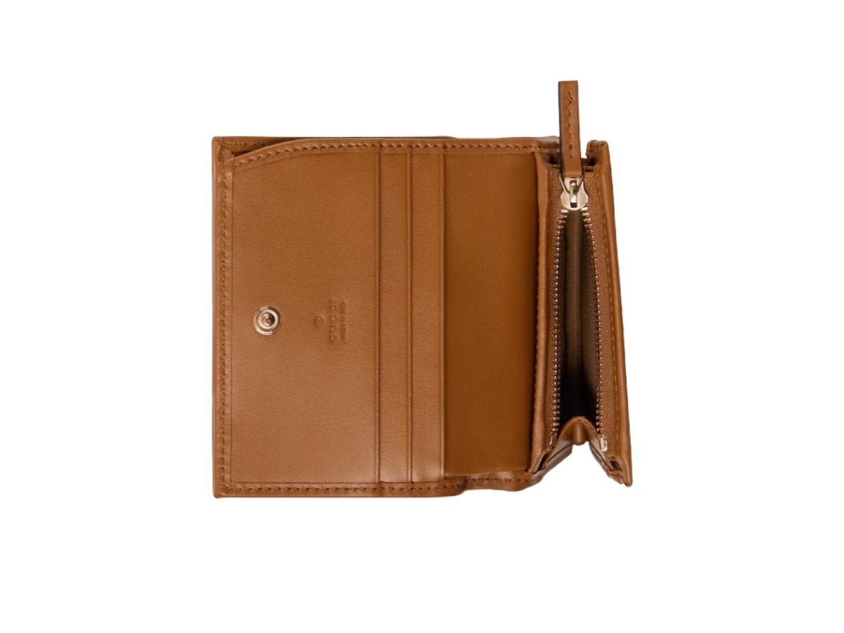 https://d2cva83hdk3bwc.cloudfront.net/466492-aaet8-2718-gucci-gg-marmont-mini-in-brown-chevron-matelass-leather-with-gold-tone-hardware-2.jpg