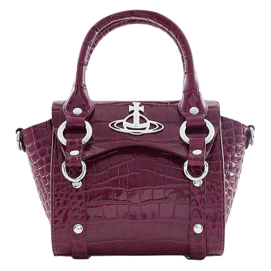 https://d2cva83hdk3bwc.cloudfront.net/48030002WL003IPURPLE-vivienne-westwood-betty-leather-shoulder-bag-crossbody-bag-handbag-mini-women-s-purple-1.jpg