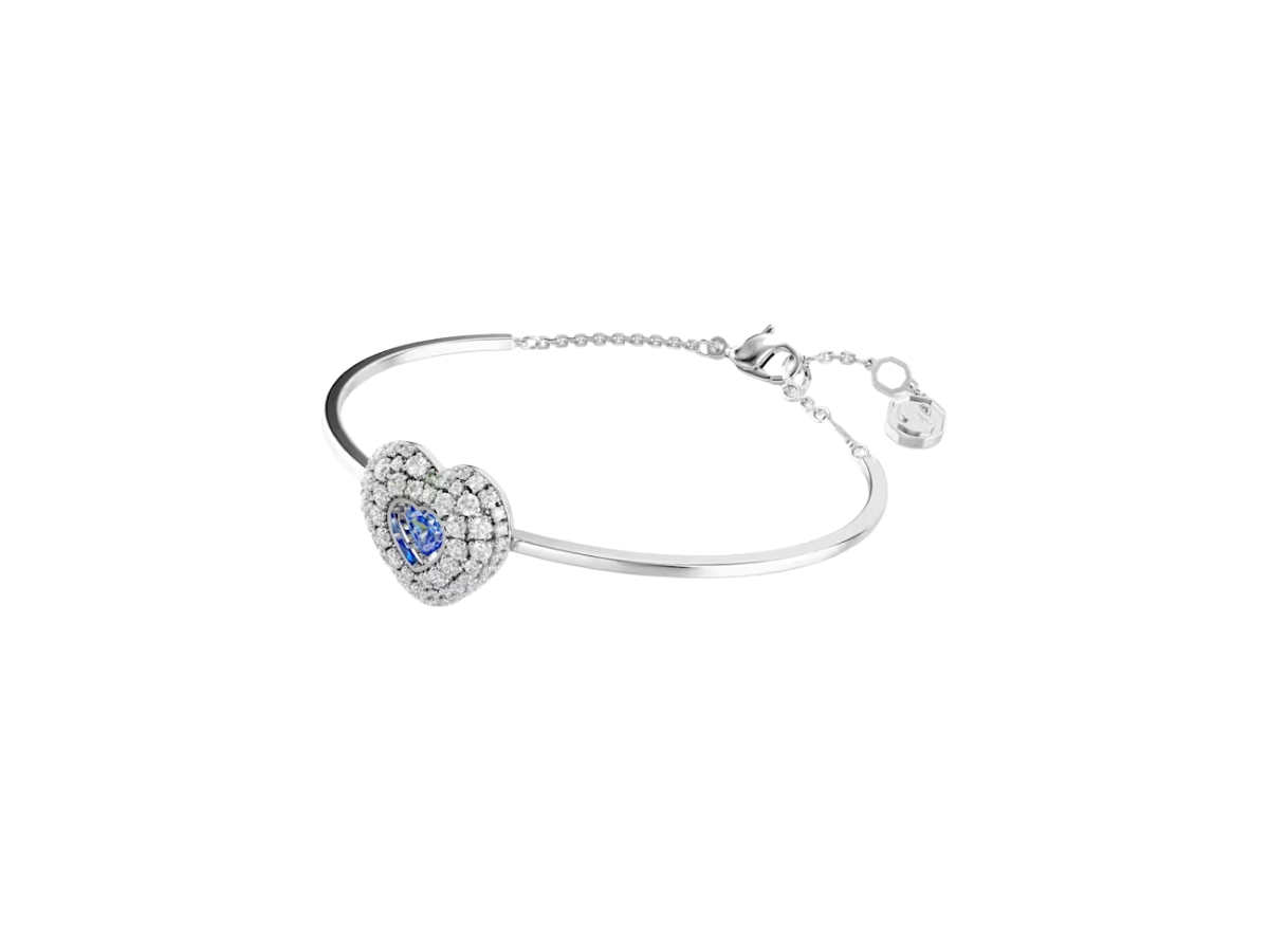 https://d2cva83hdk3bwc.cloudfront.net/5680393-swarovski-hyperbola-bangle-blue-2.jpg