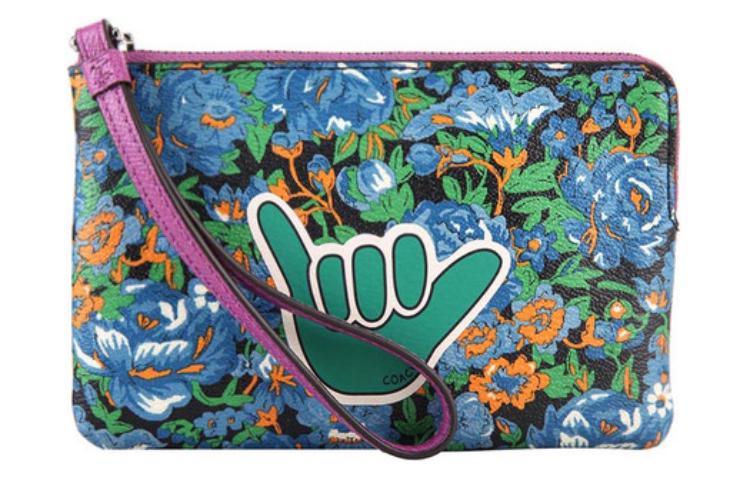 https://d2cva83hdk3bwc.cloudfront.net/57595-SVBLM-coach-corner-zip-clutches-1.jpg