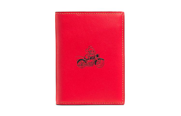 https://d2cva83hdk3bwc.cloudfront.net/59411-RED-disney-x-coach-passport-case-passport-holders-red-1.jpg