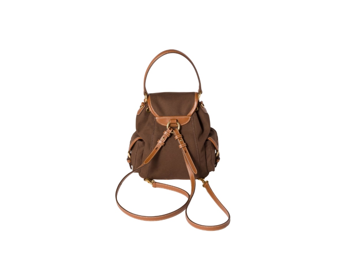 https://d2cva83hdk3bwc.cloudfront.net/5bz043-2ibq-f04kb-v-ooo-miu-miu-canvas-and-leather-backpack-cocoa-brown-brandy-2.jpg