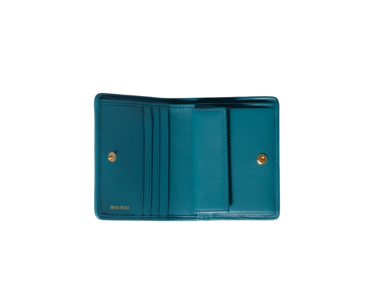 https://d2cva83hdk3bwc.cloudfront.net/5mv204-afpp-f0f16-miu-miu-wallet-with-snap-closure-blue-2.jpg