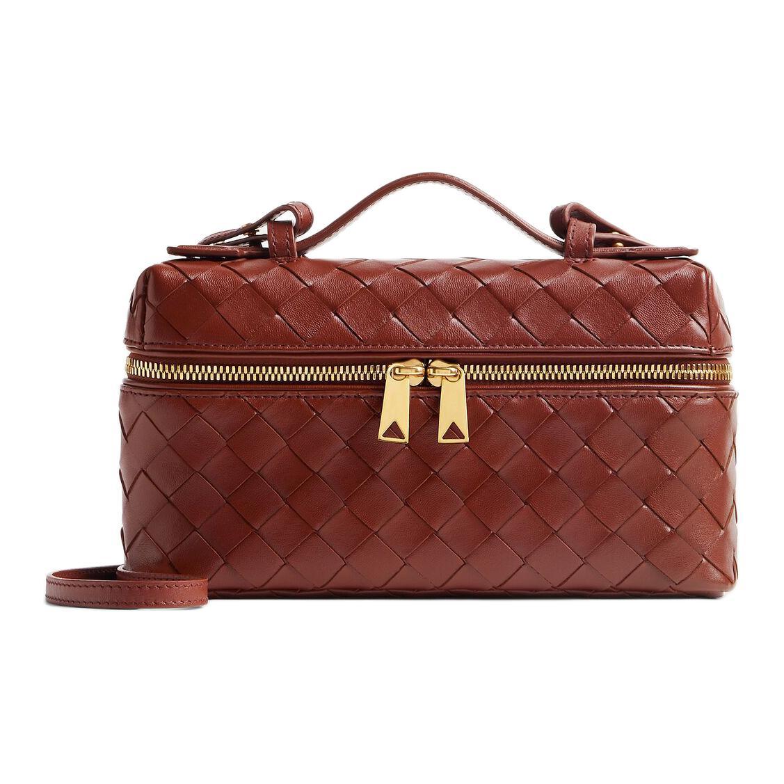 https://d2cva83hdk3bwc.cloudfront.net/789109V3IV12504-bottega-veneta-cow-leather-makeup-bag-women-s-sapele-red-1.jpg