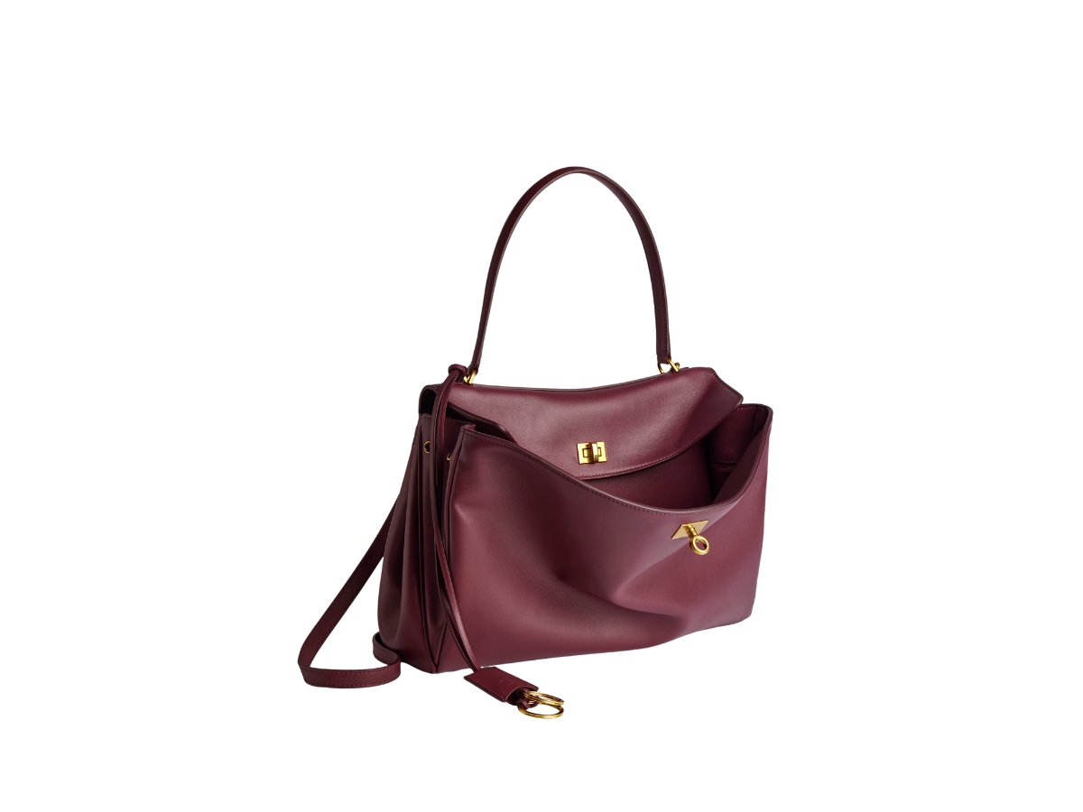 https://d2cva83hdk3bwc.cloudfront.net/7897722AA4V6034-balenciaga-rodeo-medium-handbag-in-dark-burgundy-smooth-calfskin-aged-gold-hardware-2.jpg