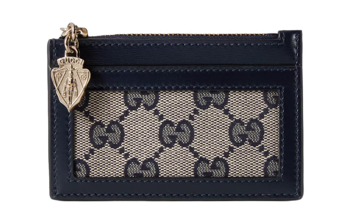 https://d2cva83hdk3bwc.cloudfront.net/790033-FADHW-4064-gucci-leather-paneled-canvas-wallet-women-s-beige-blue-1.jpg