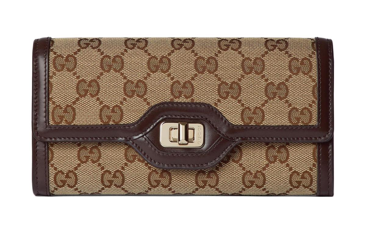 https://d2cva83hdk3bwc.cloudfront.net/790034-FADHW-9742-gucci-canvas-with-leather-trim-wallet-unisex-beige-ebony-1.jpg