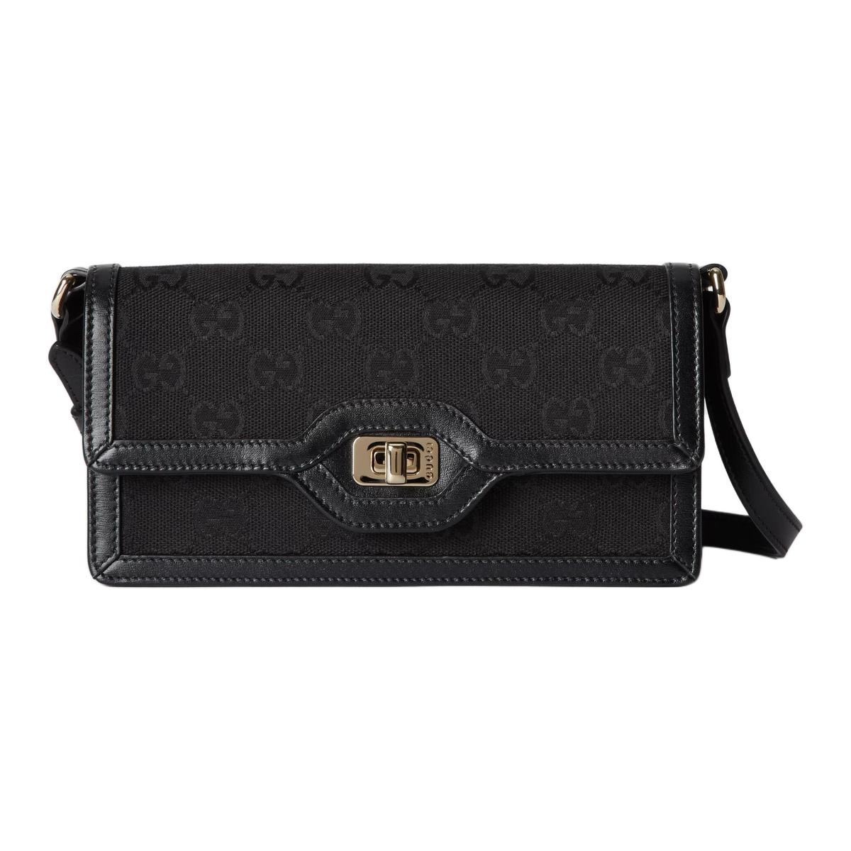 https://d2cva83hdk3bwc.cloudfront.net/790038-FADHY-1000-gucci-canvas-with-leather-handbag-shoulder-bag-women-s-black-1.jpg