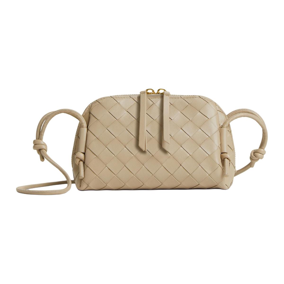 https://d2cva83hdk3bwc.cloudfront.net/794258VCPP19615-bottega-veneta-sheepskin-clutch-women-s-light-umber-1.jpg