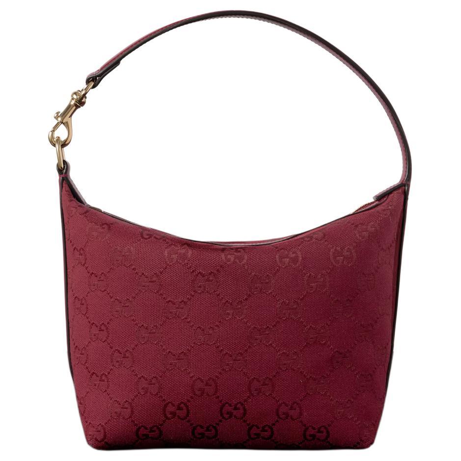 https://d2cva83hdk3bwc.cloudfront.net/795168-FADMJ-6207-gucci-canvas-with-leather-trim-handbag-shoulder-bag-extra-mini-women-s-red-1.jpg