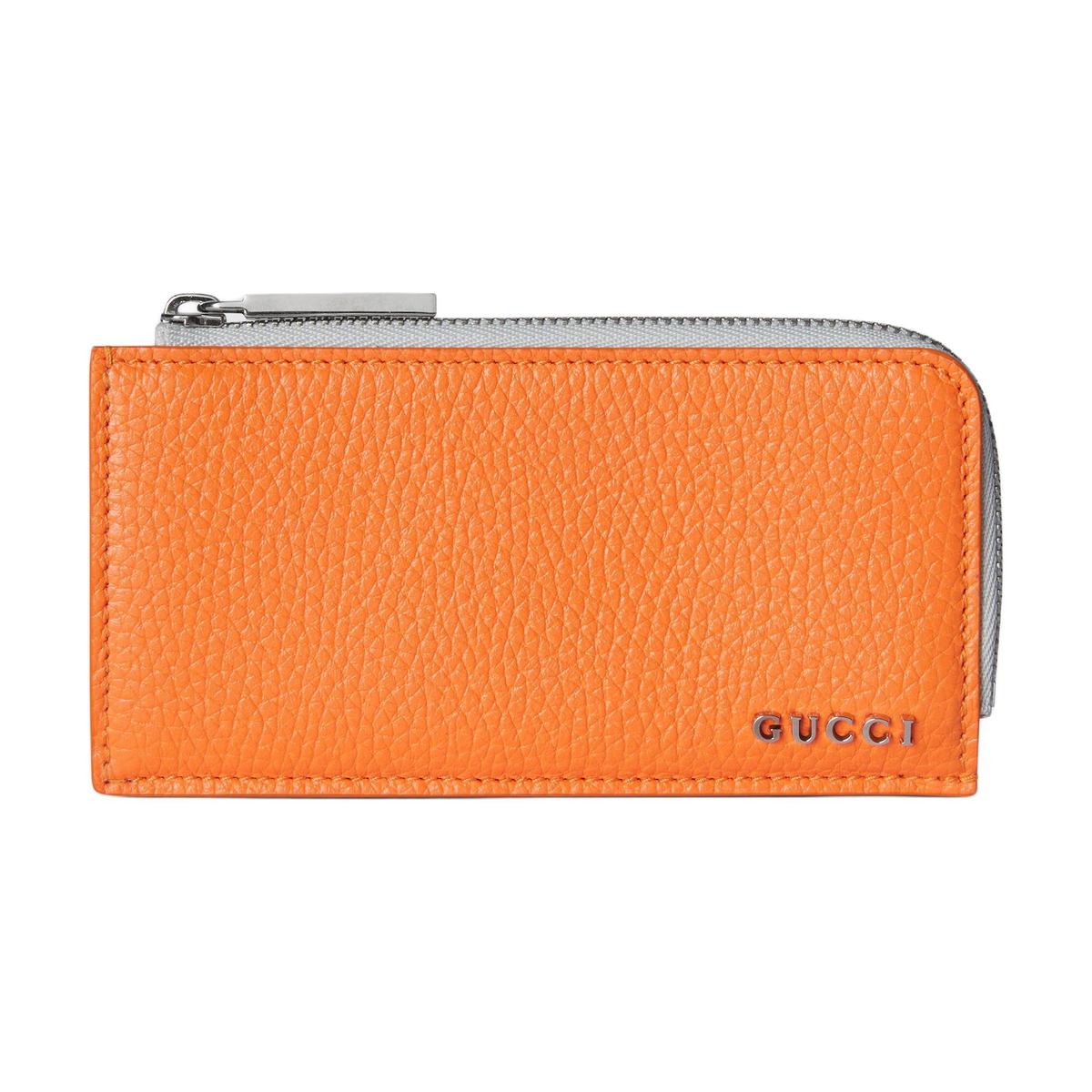 https://d2cva83hdk3bwc.cloudfront.net/795286-AAEBR-7541-gucci-leather-coin-purse-men-s-orange-white-1.jpg