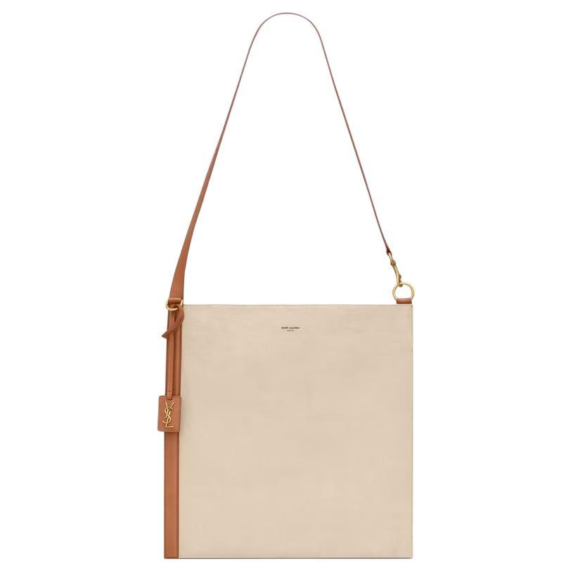 https://d2cva83hdk3bwc.cloudfront.net/797689-FADQZ-9856-saint-laurent-canvas-with-leather-and-cotton-calfskin-tote-bag-shopping-bag-shoulder-bags-women-s-sand-1.jpg
