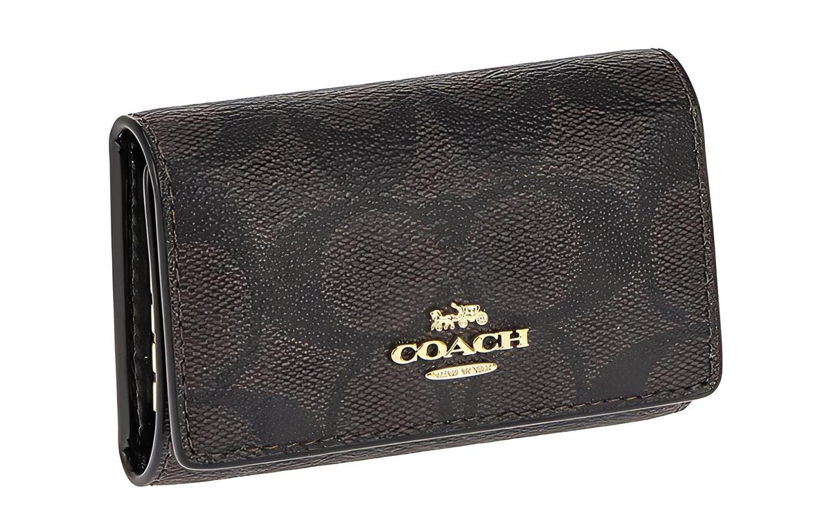 https://d2cva83hdk3bwc.cloudfront.net/7998-IMAA8-coach-key-case-canvas-with-leather-key-pouch-women-s-dark-wood-brown-1.jpg