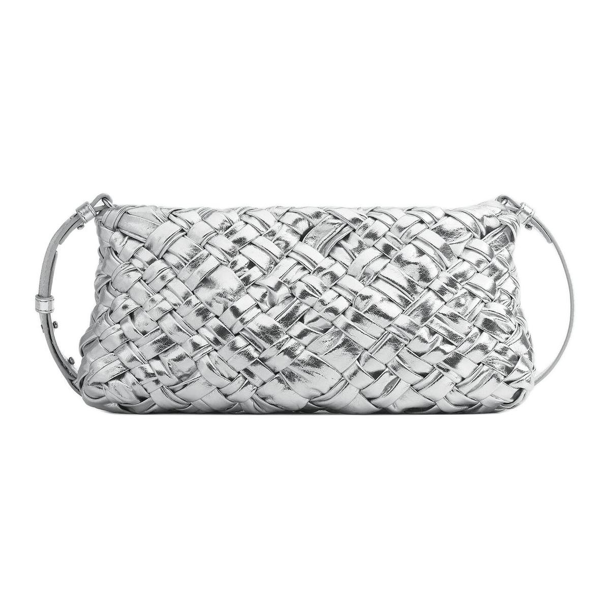 https://d2cva83hdk3bwc.cloudfront.net/804487V4P318101-bottega-veneta-sheepskin-one-shoulder-crossbody-clutches-women-s-silver-1.jpg
