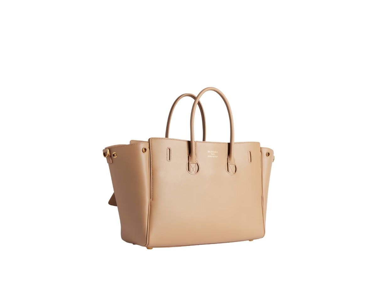 https://d2cva83hdk3bwc.cloudfront.net/8125452ABAV2621-balenciaga-bel-air-small-carry-all-bag-in-latte-smooth-calfskin-aged-gold-hardware-3.jpg