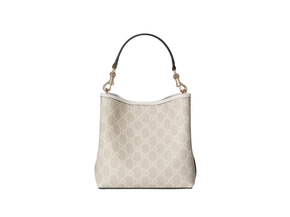 https://d2cva83hdk3bwc.cloudfront.net/815118-fad6l-9641-gucci-gg-emblem-small-bucket-bag-beige-2.jpg