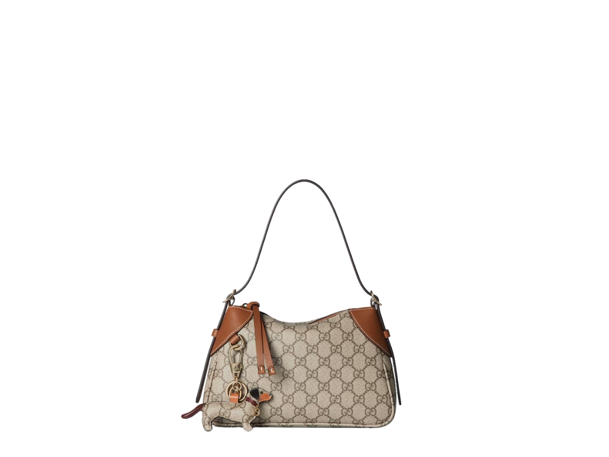 https://d2cva83hdk3bwc.cloudfront.net/815218-FAEAA-9762-gucci-gg-emblem-small-shoulder-bag-in-light-gold-tone-hardware-with-beige-and-dark-brown-3.jpg