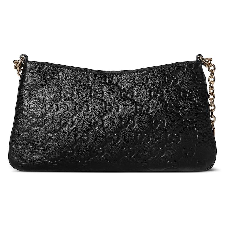 https://d2cva83hdk3bwc.cloudfront.net/815277-AAEEM-1000-gucci-gg-emblem-grained-leather-handbag-shoulder-bag-small-size-women-s-black-1.jpg