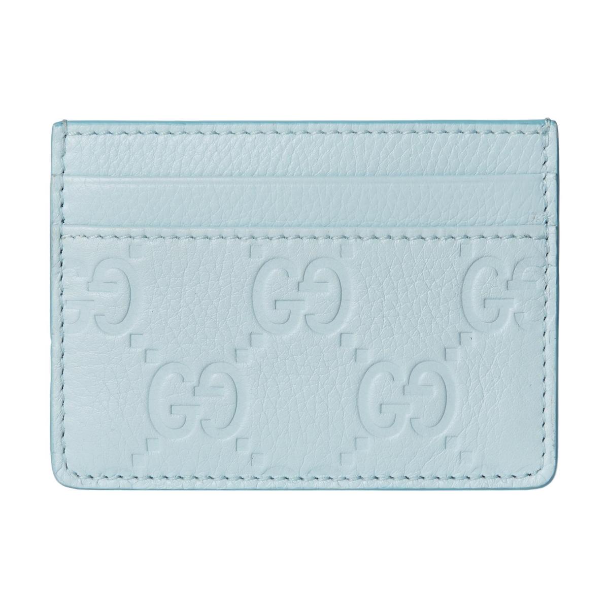 https://d2cva83hdk3bwc.cloudfront.net/815883-AAEEM-4950-gucci-gg-emblem-grained-leather-card-holder-women-s-light-blue-1.jpg