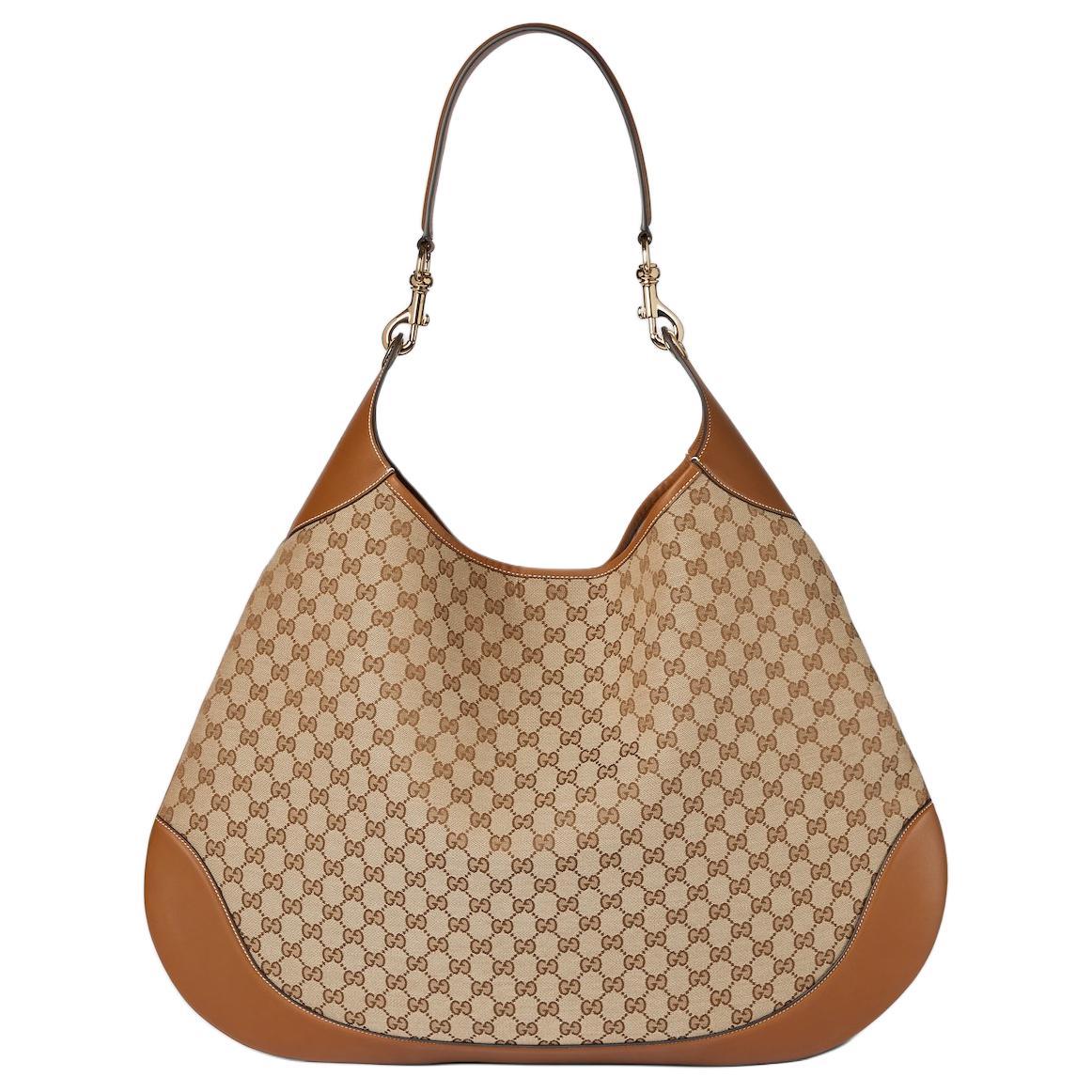 https://d2cva83hdk3bwc.cloudfront.net/815923-HAAKG-9755-gucci-canvas-one-shoulder-handbags-large-size-women-s-beige-dark-brown-1.jpg
