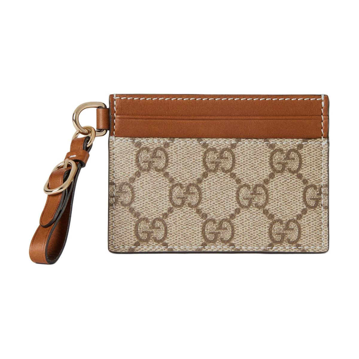https://d2cva83hdk3bwc.cloudfront.net/819121-FAD6L-9758-gucci-coated-canvas-card-holder-women-s-beige-brown-1.jpg