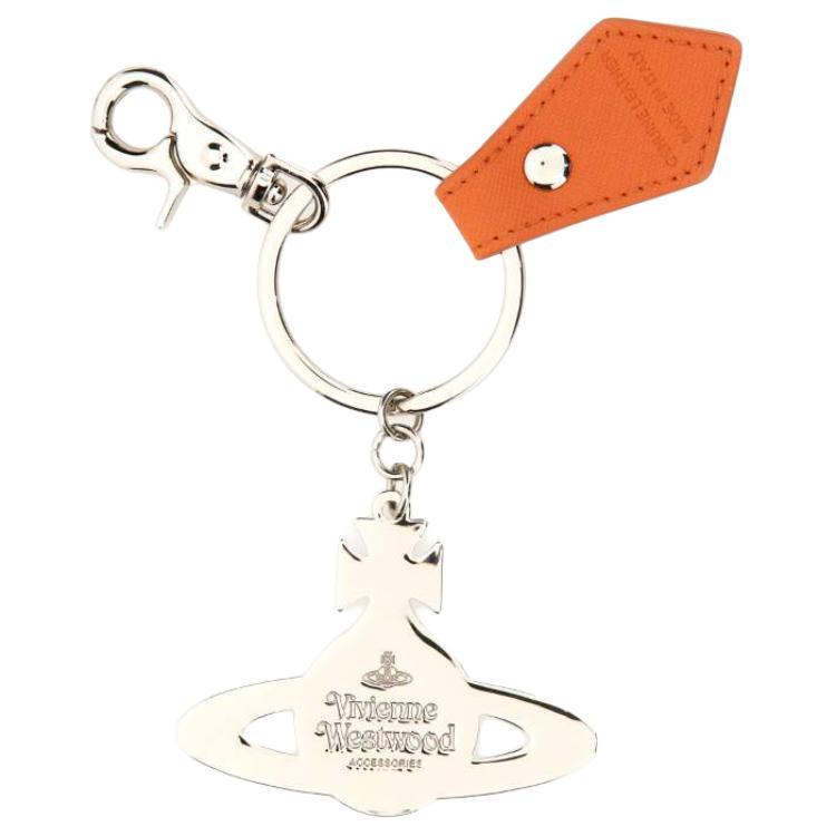 https://d2cva83hdk3bwc.cloudfront.net/82030016OM0009F401-vivienne-westwood-leather-keychains-women-s-white-1.jpg