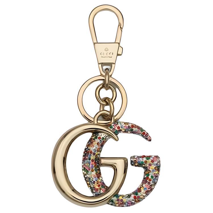 https://d2cva83hdk3bwc.cloudfront.net/820826J1D4T8751-gucci-crystal-metal-keychains-women-s-gold-1.jpg