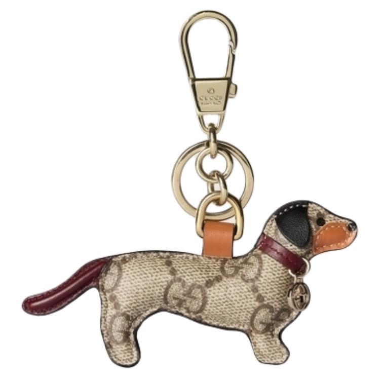 https://d2cva83hdk3bwc.cloudfront.net/8218129AAGV-1-gucci-leather-pendants-unisex-brown-1.jpg