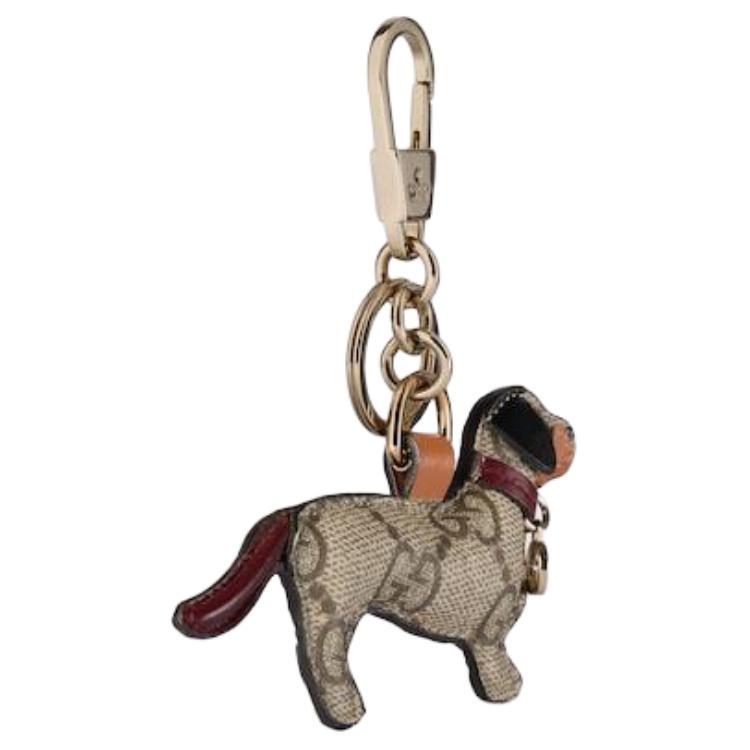 https://d2cva83hdk3bwc.cloudfront.net/8218129AAGV8076-gucci-leather-keychains-unisex-brown-1.jpg
