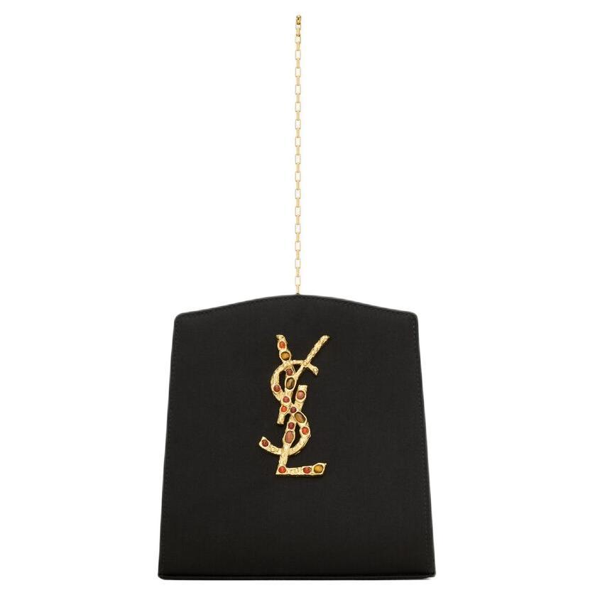 https://d2cva83hdk3bwc.cloudfront.net/832251FAEMY-1000-saint-laurent-fabric-clutch-small-size-women-s-black-1.jpg