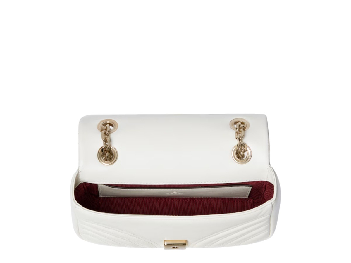 https://d2cva83hdk3bwc.cloudfront.net/837280-aae38-9050-gucci-gg-marmont-small-in-white-chevron-matelass-lambskin-with-light-gold-tone-hardware-2.jpg