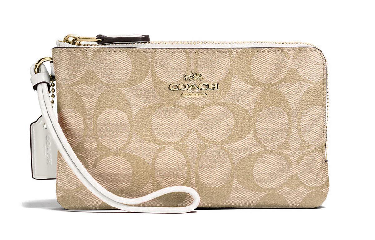 https://d2cva83hdk3bwc.cloudfront.net/87591-IMDQC-coach-corner-zip-coated-canvas-mahjong-themed-wrist-bags-and-clutches-small-size-women-s-light-khaki-white-1.jpg