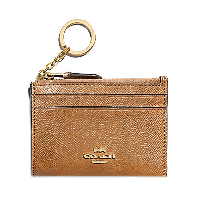 https://d2cva83hdk3bwc.cloudfront.net/88250-IMLQD-coach-mini-id-skinny-leather-card-holder-mini-women-s-caramel-1.jpg