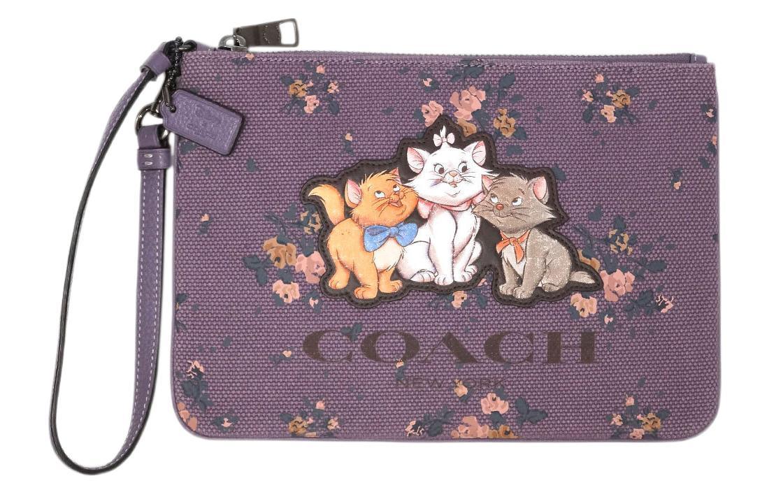 https://d2cva83hdk3bwc.cloudfront.net/91184-QBOR3-disney-x-coach-gallery-clutches-1.jpg