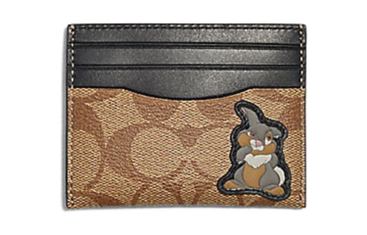 https://d2cva83hdk3bwc.cloudfront.net/91245-QB-disney-x-coach-card-case-card-holders-1.jpg